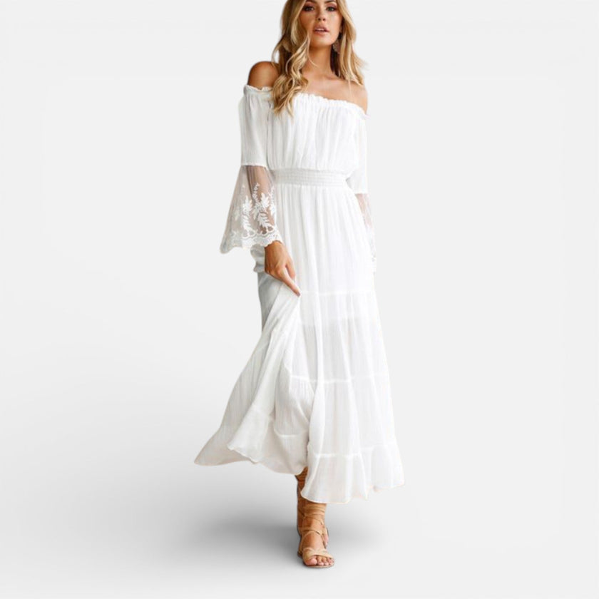 Women's off-shoulder lace maxi dress by FJØRNA featuring an elegant summer design, perfect for warm-weather occasions.