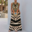 FJØRNA floral sleeveless maxi dress with relaxed fit and pockets, featuring a bold leopard print for women.