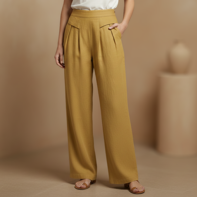 Women’s high waist cotton linen wide leg trousers by FJØRNA with relaxed fit and side pockets, in plain color.
