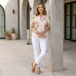 FJØRNA women's summer floral blouse with V-neck, puff sleeves, and high waist, styled for a casual, breezy look