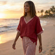 FJØRNA women's summer two-piece set with striped high-waist co-ord, featuring stylish matching top and skirt in a lifestyle setting.