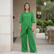 FJØRNA relaxed two-piece set featuring flowing wide-leg pants and a stylish top, perfect for casual elegant wear.