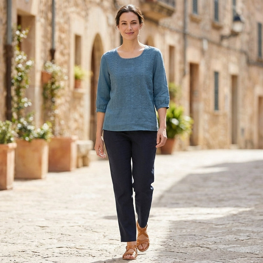 FJØRNA summer floral cotton blouse for women, lightweight top with a colorful floral pattern, perfect for warm weather.