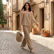 FJØRNA relaxed coastal camisole and wide-leg pants 2-piece set worn in a casual outdoor setting, featuring lightweight fabric and comfortable fit.