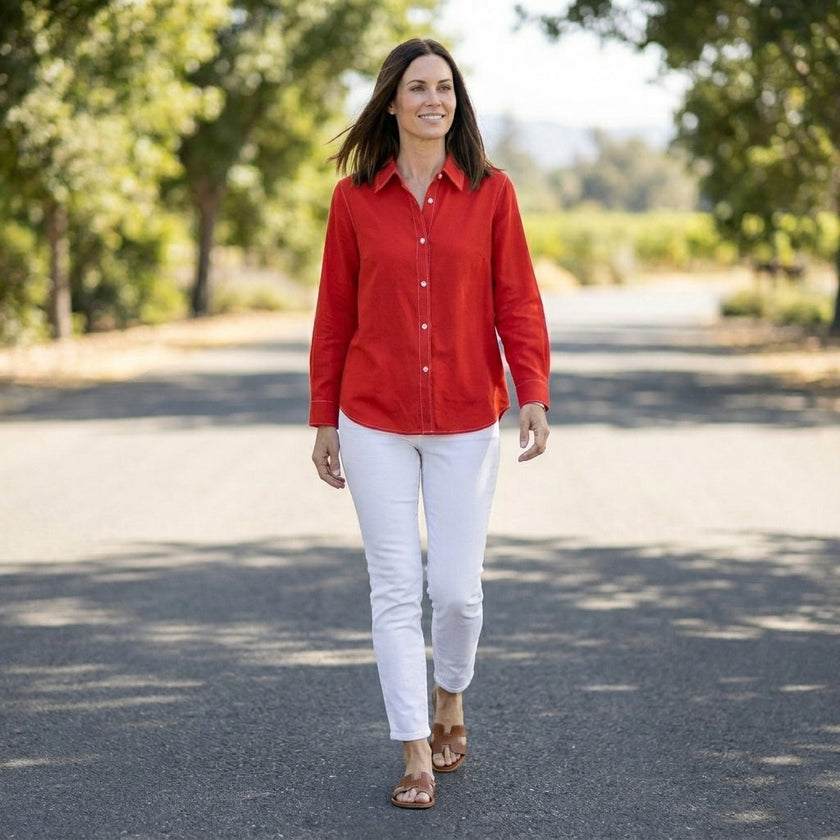 FJØRNA women's linen summer blouse with button front, styled casually, perfect for warm weather, lightweight and breathable fabric.