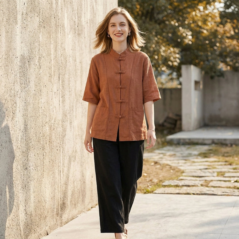 FJØRNA summer women's blouse with denim pockets, lightweight top perfect for warm weather, casual style, and relaxed fit.