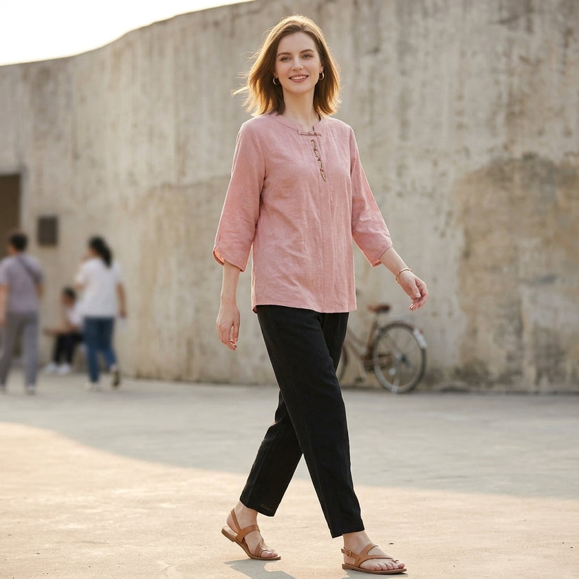 FJØRNA women's summer blouse in denim with tassel details, featuring a casual fit and stylish design for warm weather.