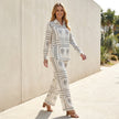 FJØRNA desert sketch print relaxed shirt and wide-leg pants 2-piece set worn in a casual lifestyle setting.