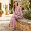 FJØRNA relaxed blazer and wide-leg trouser 2-piece set styled casually in a modern lifestyle setting.