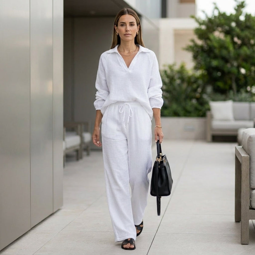 FJØRNA oversized two-piece crinkle-texture suit with relaxed fit and drawstring waist in a casual lifestyle setting