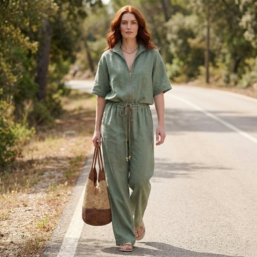 FJØRNA zip-neck top and wide-leg trouser set in a stylish, casual lifestyle scene, showcasing the comfortable, coordinated 2-piece outfit.