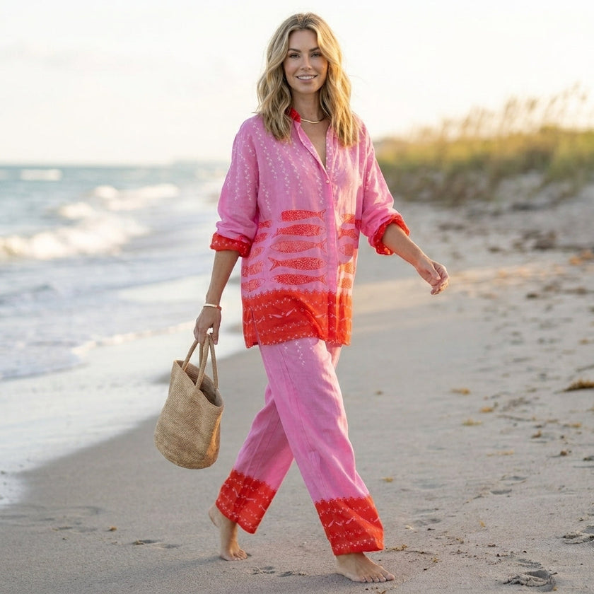 FJØRNA relaxed two-piece set featuring nautical and geometric graphic motifs, worn in a casual lifestyle setting.