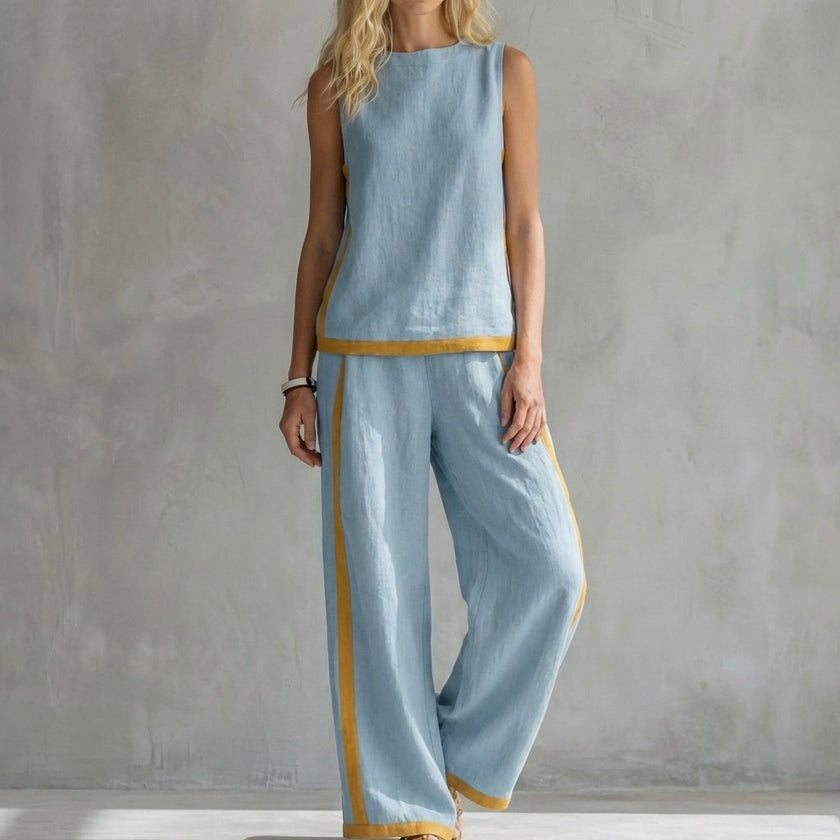 Light blue FJØRNA summer two-piece women's co-ord set with a slit design, featuring a stylish crop top and matching skirt.