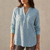 Light blue FJØRNA women's textured button-front blouse with chest pockets and relaxed fit, casual and stylish top for women.