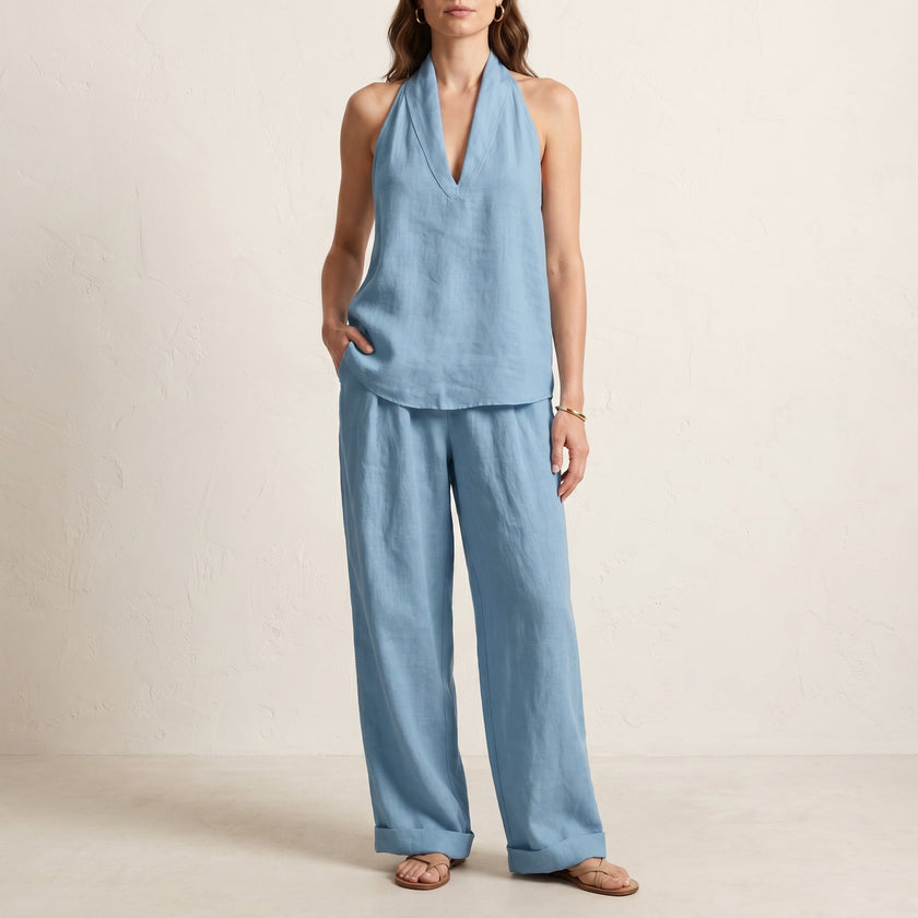 Light blue FJØRNA relaxed two-piece halter V-neck set with wide-leg pants, casual and stylish summer outfit.