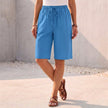 Light blue FJØRNA women's summer cotton shorts with drawstring waist, casual and comfortable for warm weather.