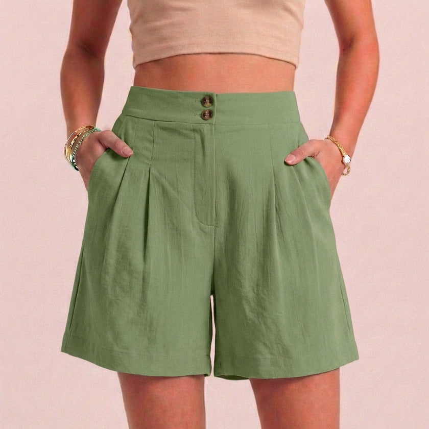 Light green women's summer shorts by FJØRNA featuring high waist, linen fabric, breathable design, and front pockets.
