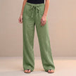 Light green high-waist cotton summer trousers for women by FJØRNA, featuring a relaxed fit and casual style.