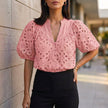 Light pink women's summer blouse by FJØRNA featuring a V-neck, linen fabric, button front, casual top for warm weather.