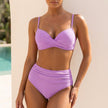 Light purple FJØRNA bikini set with ruched twist-front design and tummy control for women, perfect for beach or pool days.