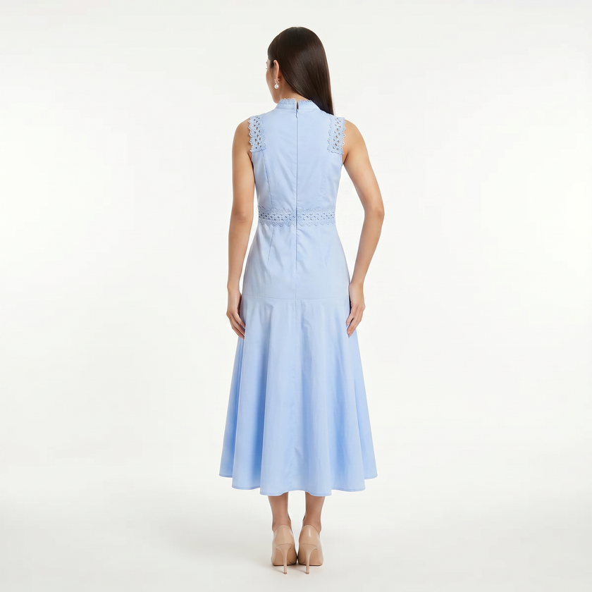 Light blue women's sleeveless lace panel midi dress by FJØRNA, back view showing delicate lace details and flowing silhouette.