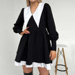 FJØRNA Like a Doll black collar dress featuring a fitted silhouette, ideal for streetwear and Y2K fashion styles.