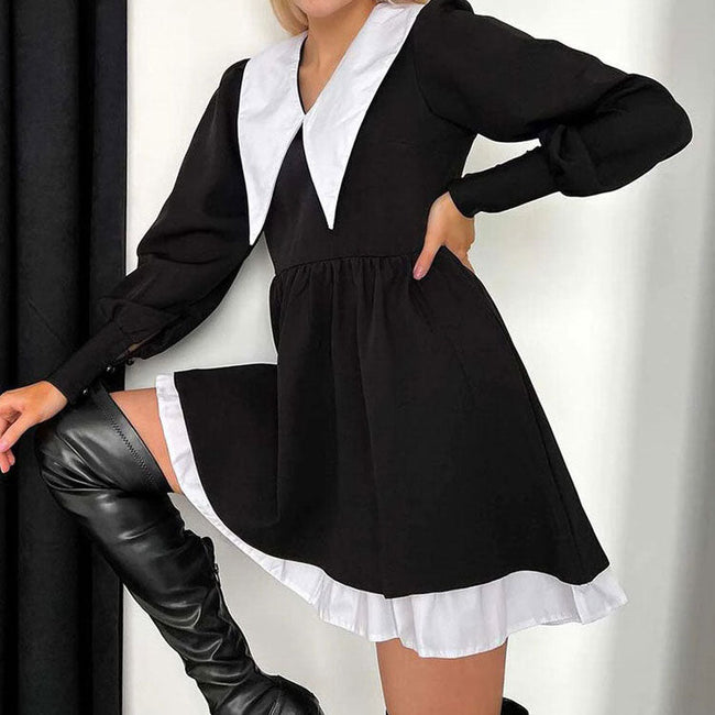 FJØRNA Like a Doll black collar dress with tie detail, stylish Y2K-inspired dress featuring a sleek design and modern silhouette.