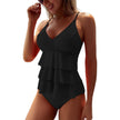 Women's summer V-neck swimsuit with ruffles by FJØRNA, featuring a flattering fit and stylish design for beach or pool.