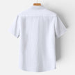 Men's FJØRNA linen shirt with short sleeves, breathable fabric, classic fit, perfect for casual and summer wear.