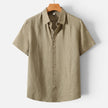 Men's FJØRNA linen shirt with short sleeves, breathable fabric, and classic fit for comfortable, stylish casual wear.