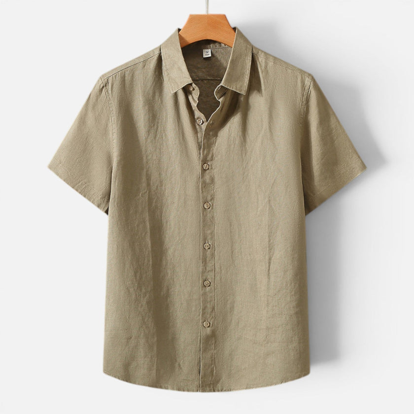 Men's FJØRNA linen shirt with short sleeves, breathable fabric, and classic fit for comfortable, stylish casual wear.