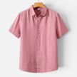 Men's FJØRNA linen shirt with short sleeves, breathable fabric, and classic fit, perfect for casual or summer wear.