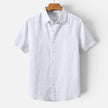 Men's FJØRNA linen shirt with short sleeves, breathable fabric, and a classic fit, ideal for casual and summer wear.