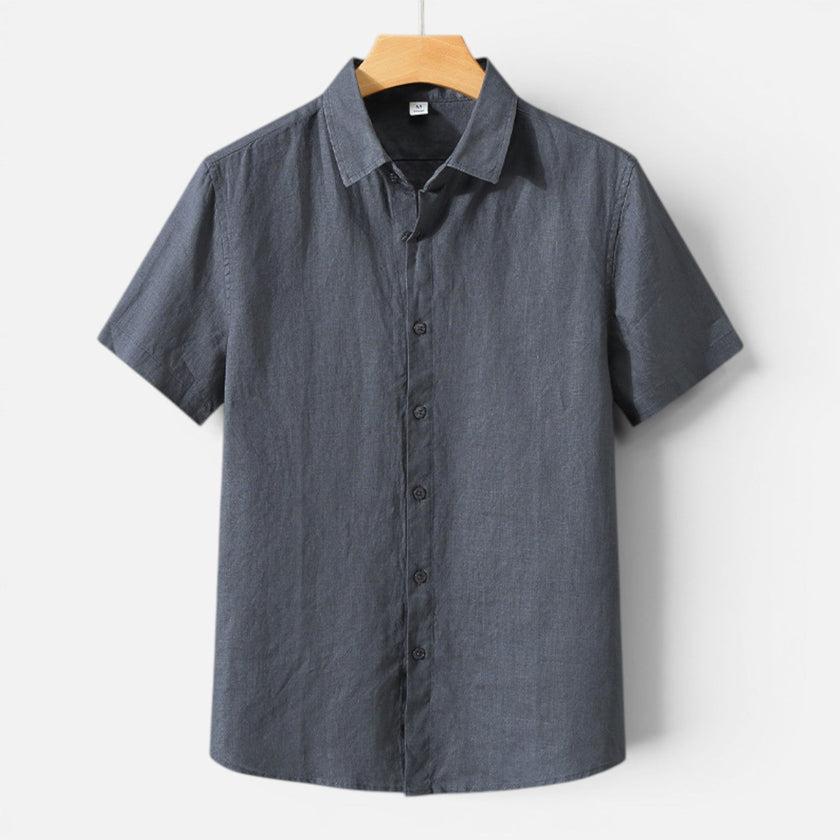 Men's FJØRNA linen shirt with short sleeves, breathable fabric, and classic fit, ideal for comfortable summer wear.