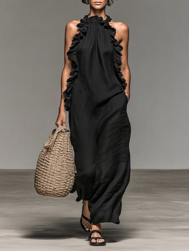 FJØRNA linen ruffle maxi dress for women featuring lightweight fabric, flowing silhouette, and ruffled details.