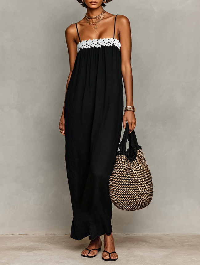 FJØRNA linen strapless maxi dress with flowing silhouette, suitable for evening wear, shown on a model with a relaxed fit and elegant style.