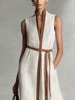 Linen V-neck maxi dress for women by FJØRNA, flowing linen fabric, sleeveless design, and elegant V-neck style.