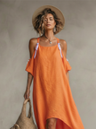 FJØRNA linen women's casual dress shown on a model, featuring a relaxed fit and natural fabric for comfortable summer wear.