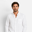 Men's linen summer outfit by FJØRNA featuring a breathable, lightweight two-piece set with a collar and button details.