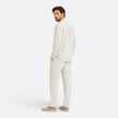 Men's linen summer outfit by FJØRNA, lightweight and breathable two-piece set with collar and button details.