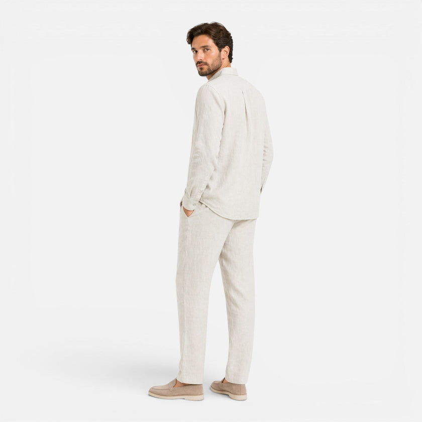 Men's linen summer outfit by FJØRNA, lightweight and breathable two-piece set with collar and button details.