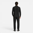 Men's lightweight linen summer outfit by FJØRNA, breathable two-piece set with collar and button details for summer wear.