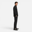 Men's linen summer outfit by FJØRNA, breathable lightweight two-piece set with collar and button details, ideal for warm weather.