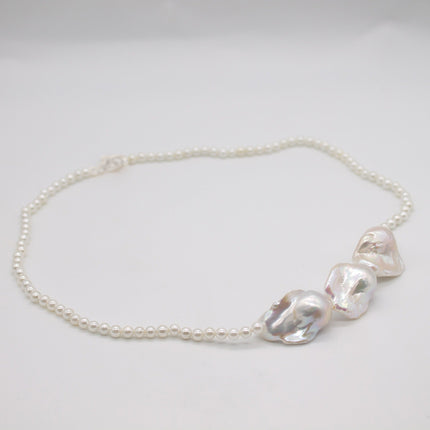 Linnestad | Elegant Necklace Featuring Large Baroque Pearls and a Stylish Silver Clasp