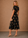 FJØRNA women's floral midi dress with button front, short sleeves, lightweight fabric, perfect for spring and summer wear.