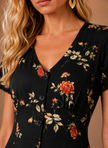 FJØRNA women's floral midi dress with button front, short sleeves, and relaxed fit, perfect for casual or summer wear.