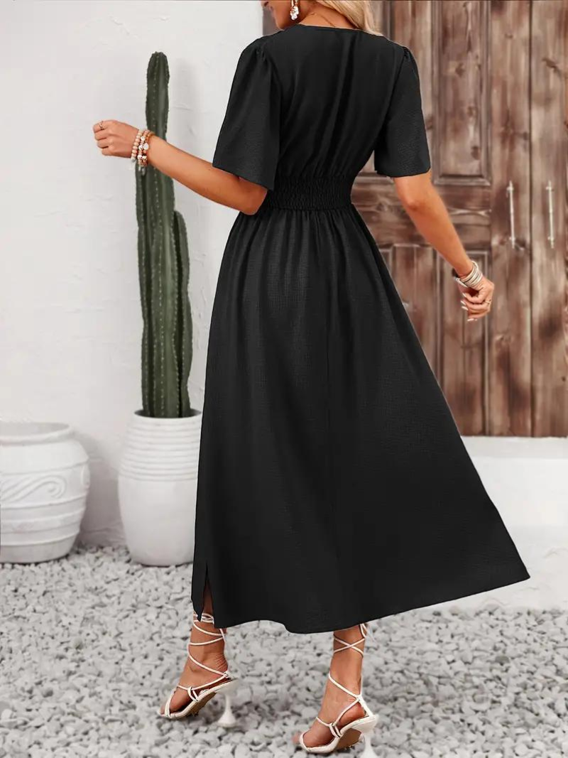 FJØRNA Arielle white long sleeve V-neck maxi sundress, flowy summer dress with a relaxed fit and elegant style.