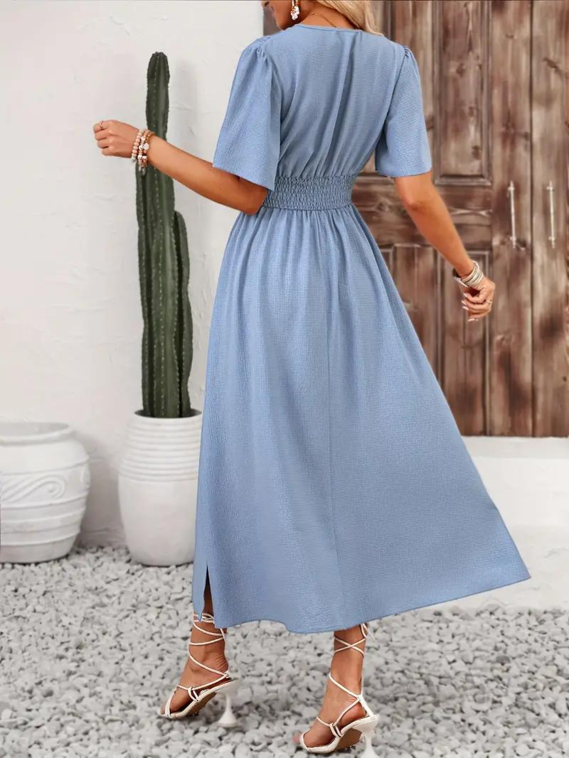 FJØRNA Arielle white maxi sundress with short sleeves and V-neck, flowing long dress perfect for summer occasions.