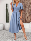 FJØRNA Arielle white long V-neck maxi sundress with short sleeves, flowing fabric, perfect for summer casual wear.