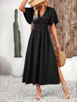 FJØRNA Arielle white long sleeve V-neck maxi sundress with a flowing silhouette and casual summer style.